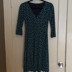 Teal and navy faux wrap dress